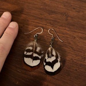 Never worn handmade feather earrings